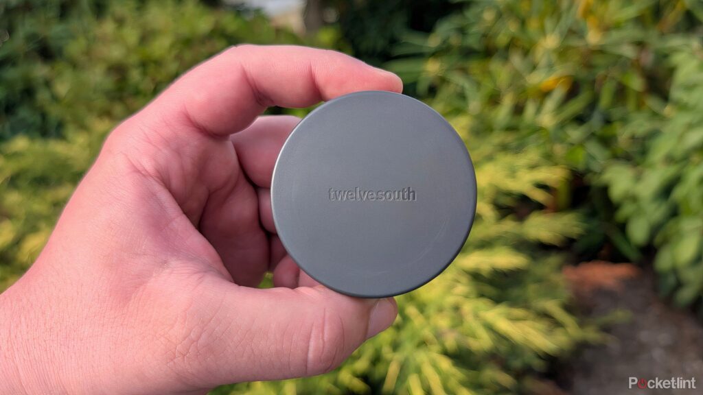 this-wireless-charger-is-so-compact,-it-rests-right-on-my-wall-outlet